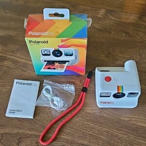 Polaroid Go Camera with Rainbow Stripe and Red Strap